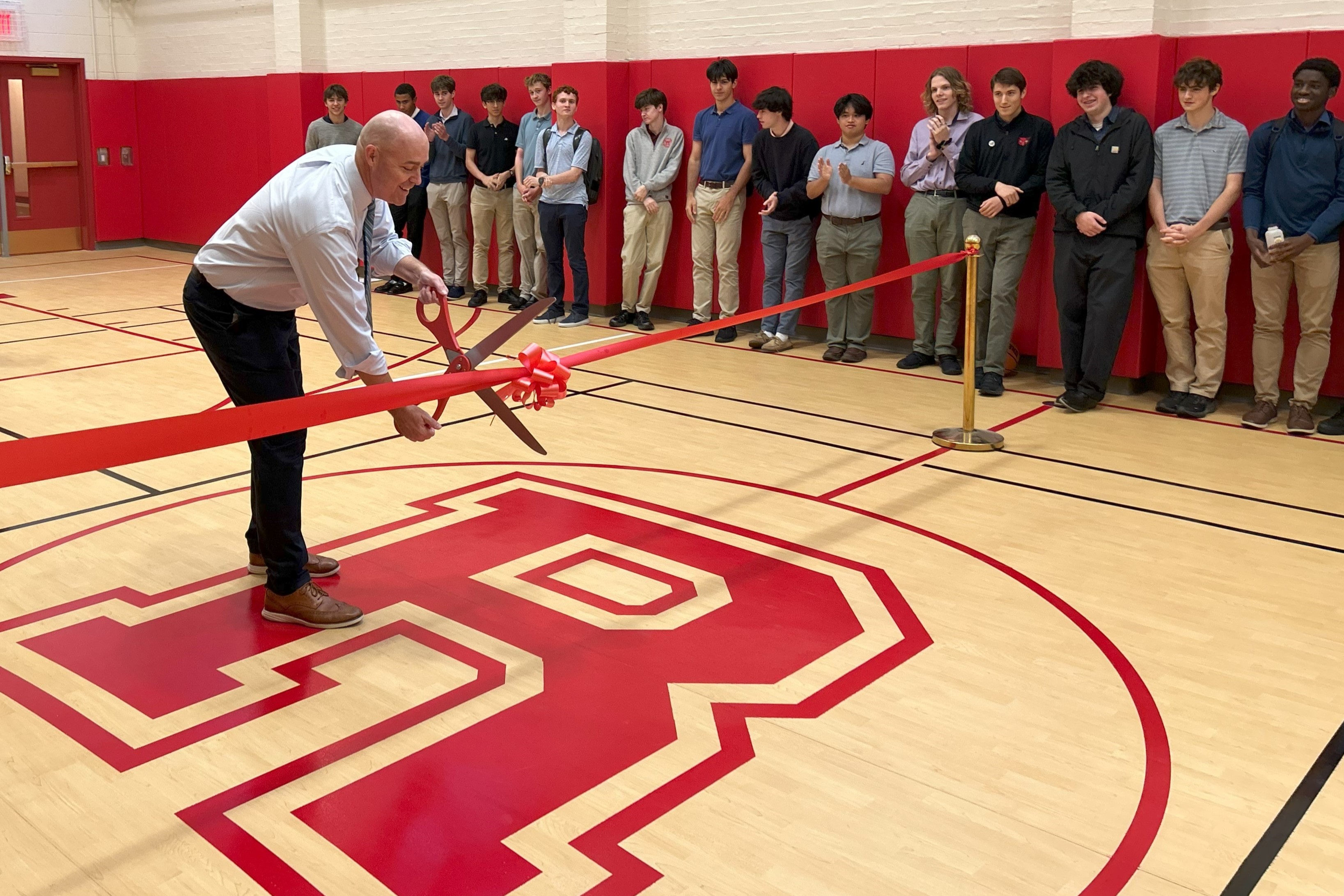 Regis Dedicates Renovated Lower Gym and New Fitness Center